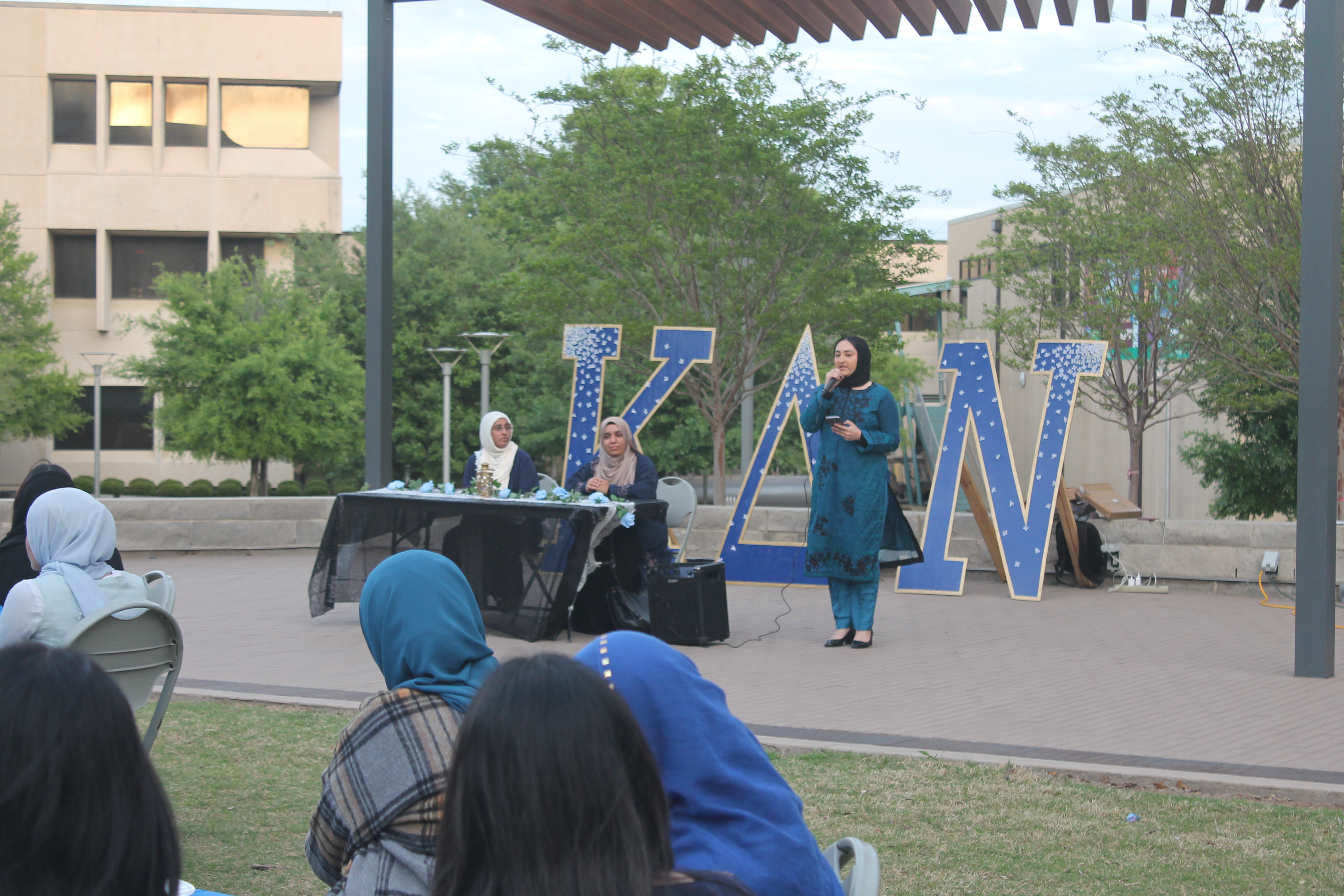 Sisters posing together at an event